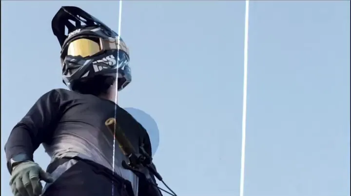 The rider from below with white lines